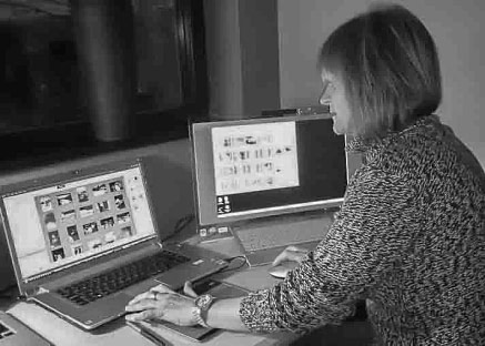 Picsave Scanning and editing About PicSave - founder, Bridget editing some digital scans